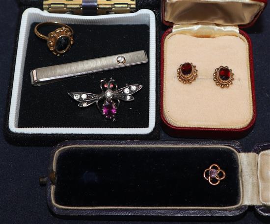 An Edwardian silver and paste bug brooch, a gold tiepin, a pair of gold ear studs, a paste set tie clip and a ring